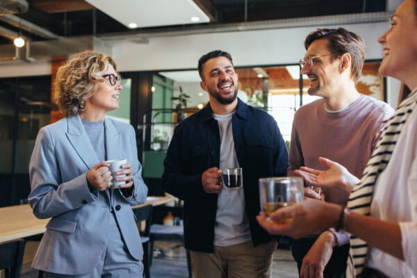 A group of colleagues taking a coffee break together.