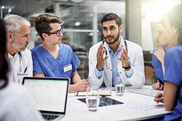 Healthcare workers in a meeting.