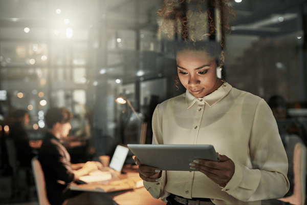 Woman with tablet device