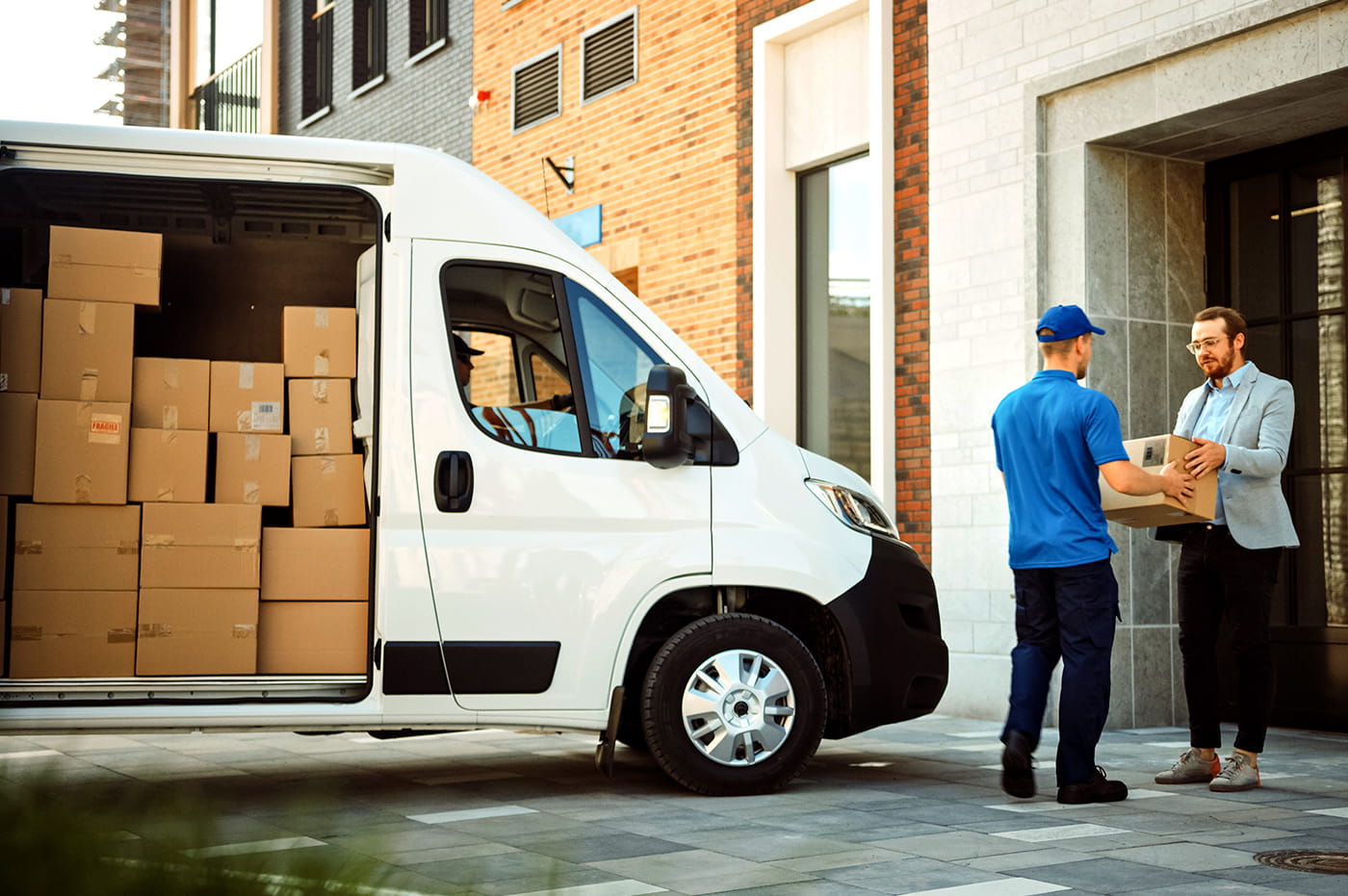 A person signing for a shipment.