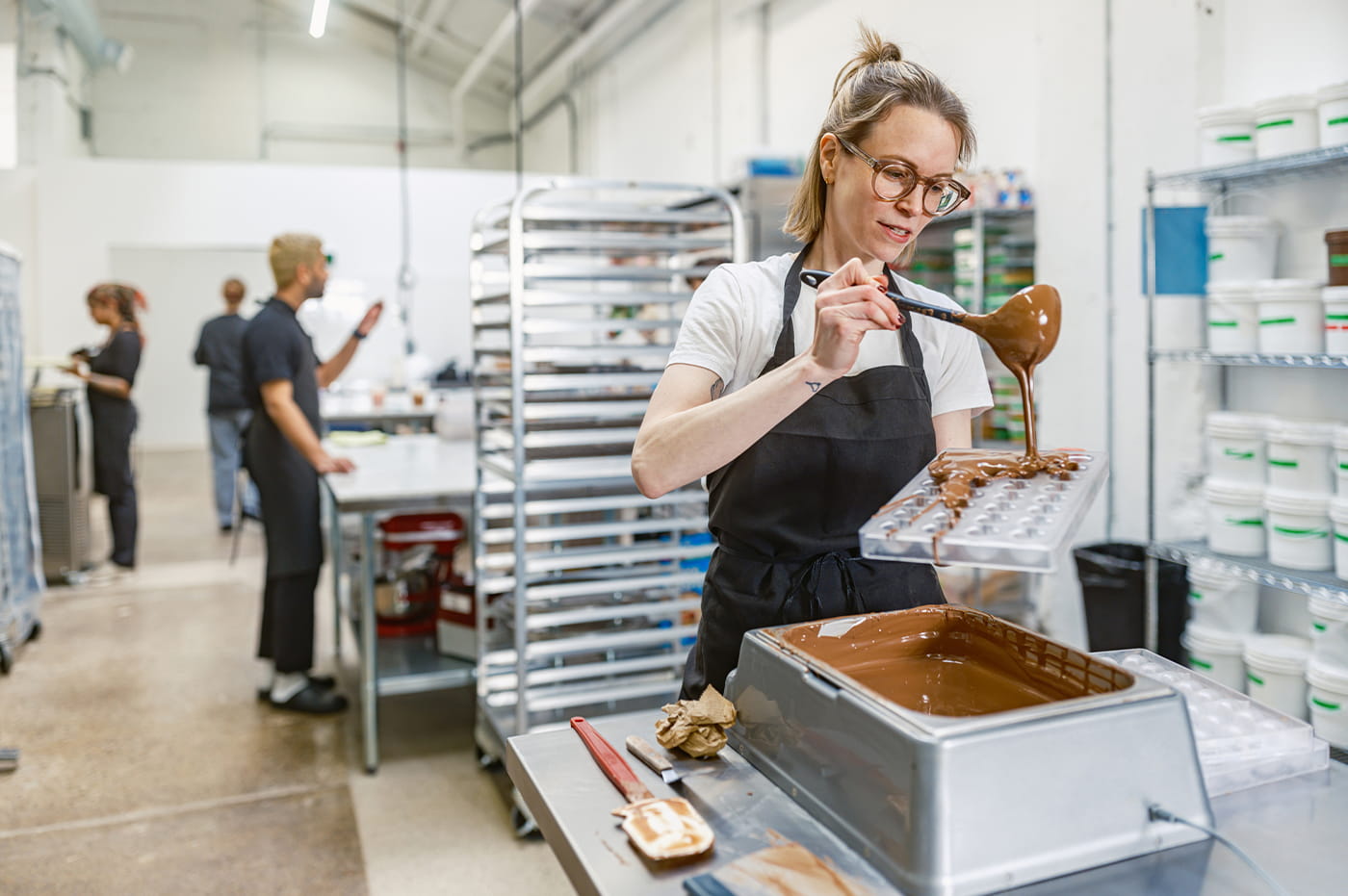 Woman making chocolate