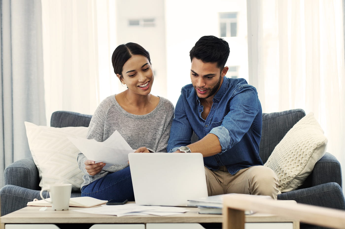 A woman and Man looking at a computer