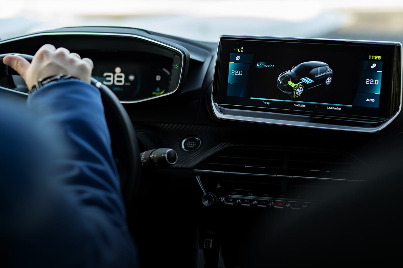 Person in a car with the dashboard screen in image