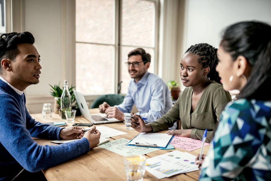 A small team of colleagues having a meeting.